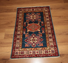 Load image into Gallery viewer, "antique kazak rug" "kazak rug origin" "antique kazak rugs for sale" "kazak rugs" "gabbeh rugs" "oushak rugs"